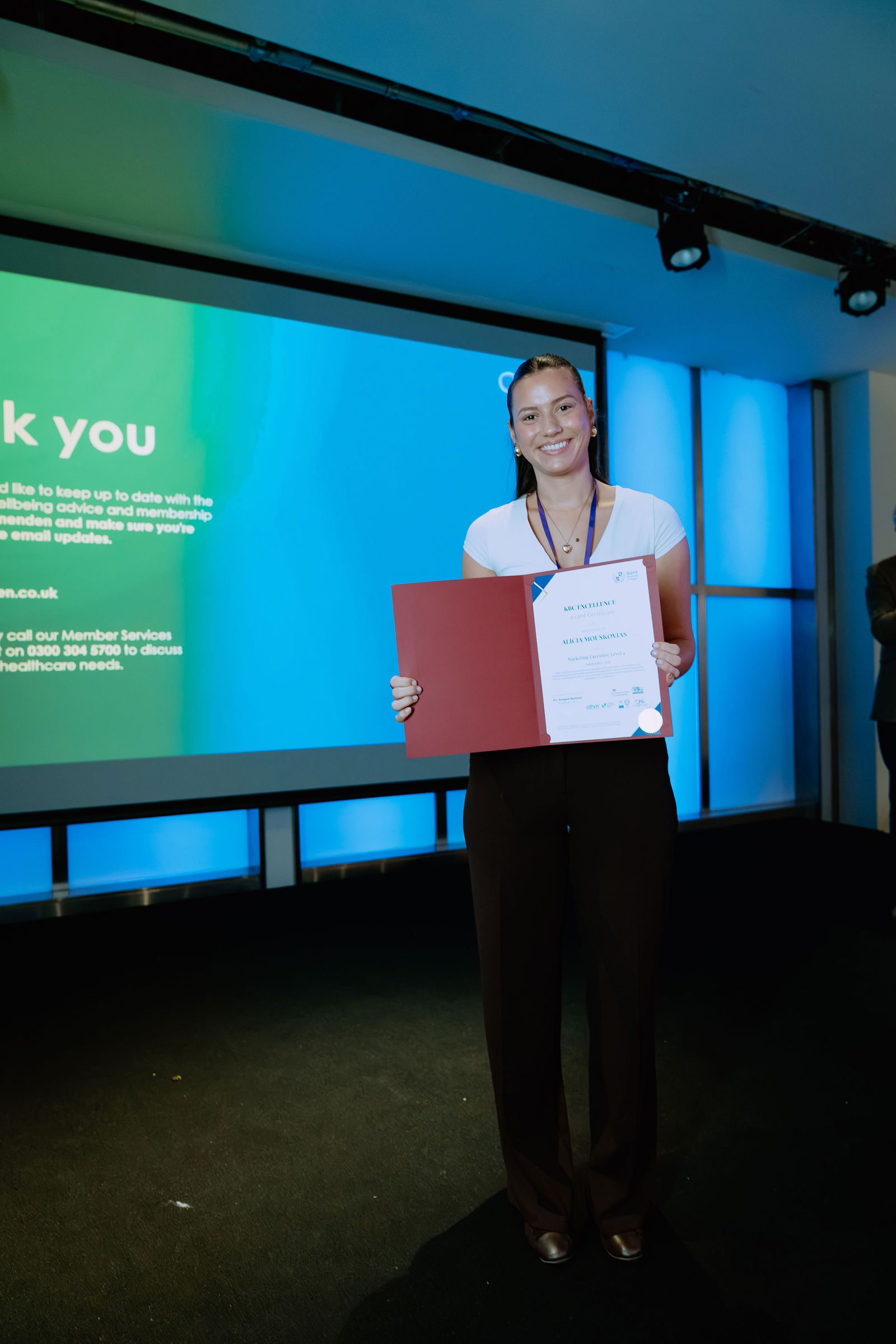 A certificate presentation moment at the London Masterclass.