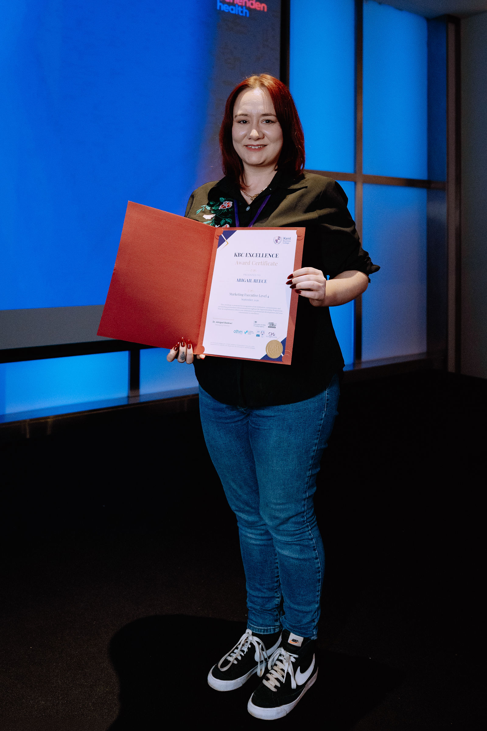 Celebrating achievement with a certificate at the London Masterclass.